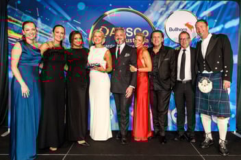 people standing on a podium 