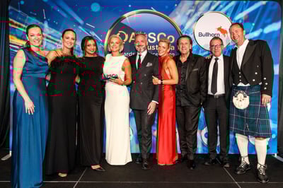 people standing on a podium 