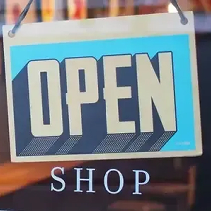 sign of a shop saying "open"