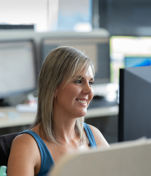 Women smiling at computer