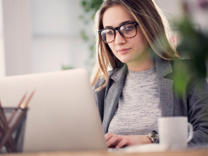 Professional woman working on laptop