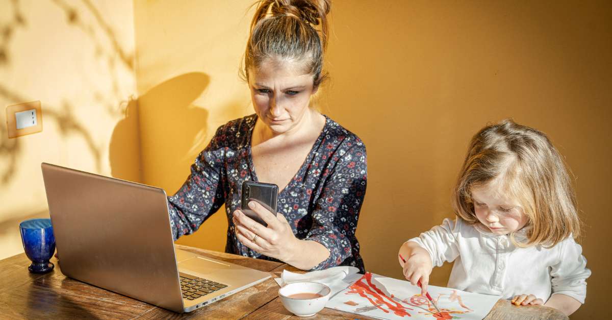 Mum working from home with toddler