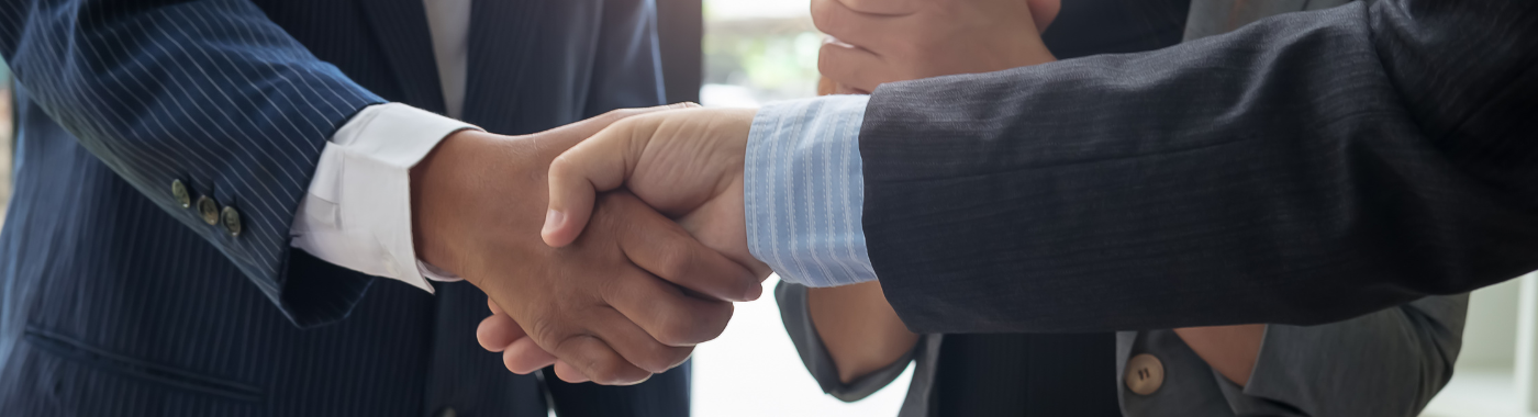 two people shaking hands