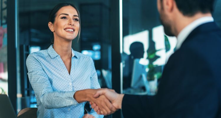 two people shaking hands